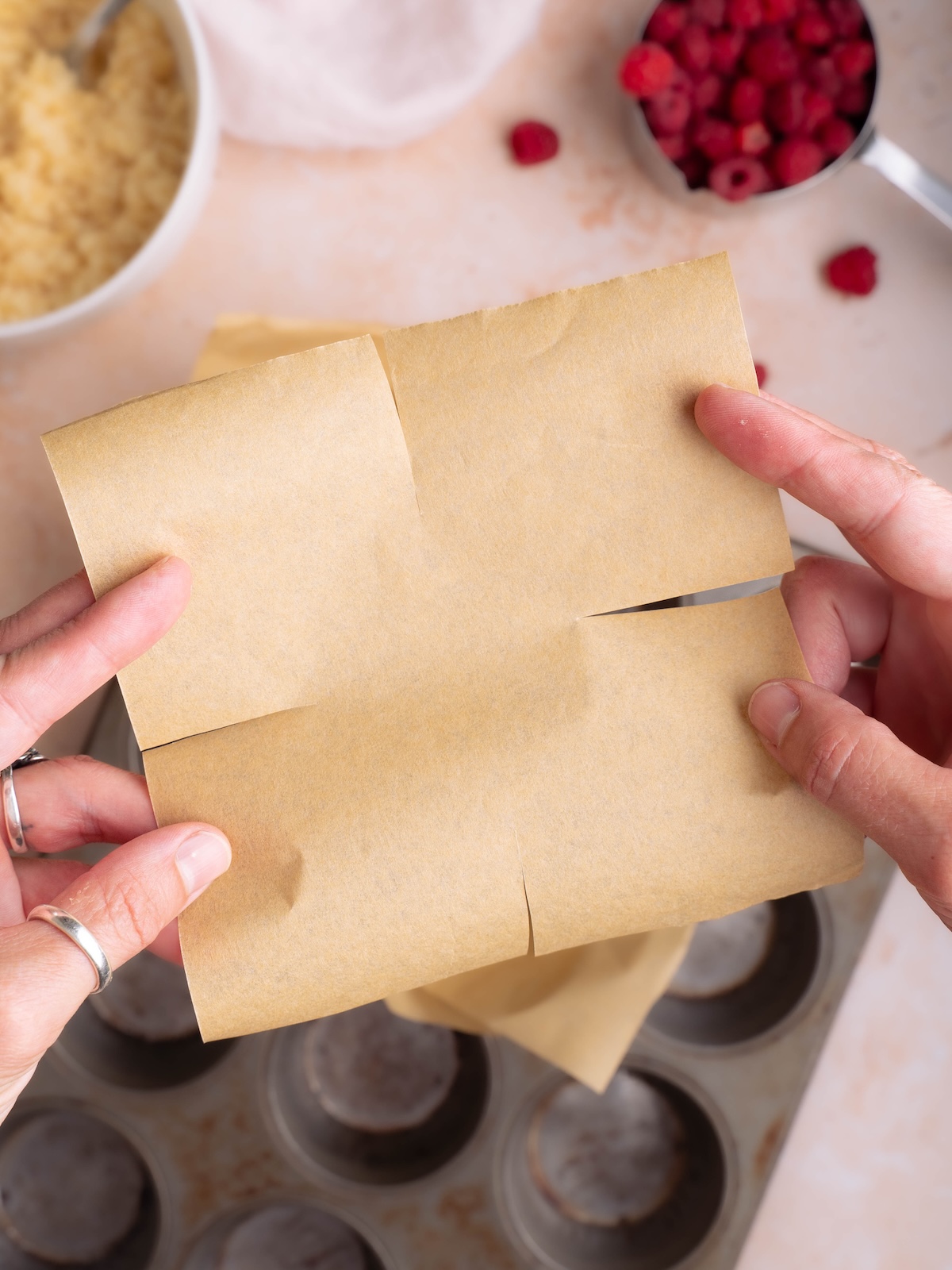Cutting parchment paper into muffin liners