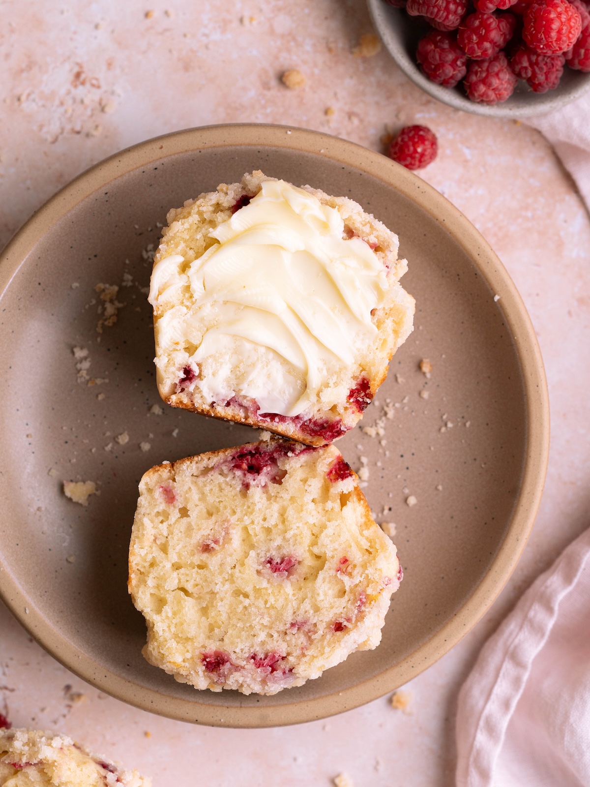 Top view of a lemon raspberry sourdough muffin