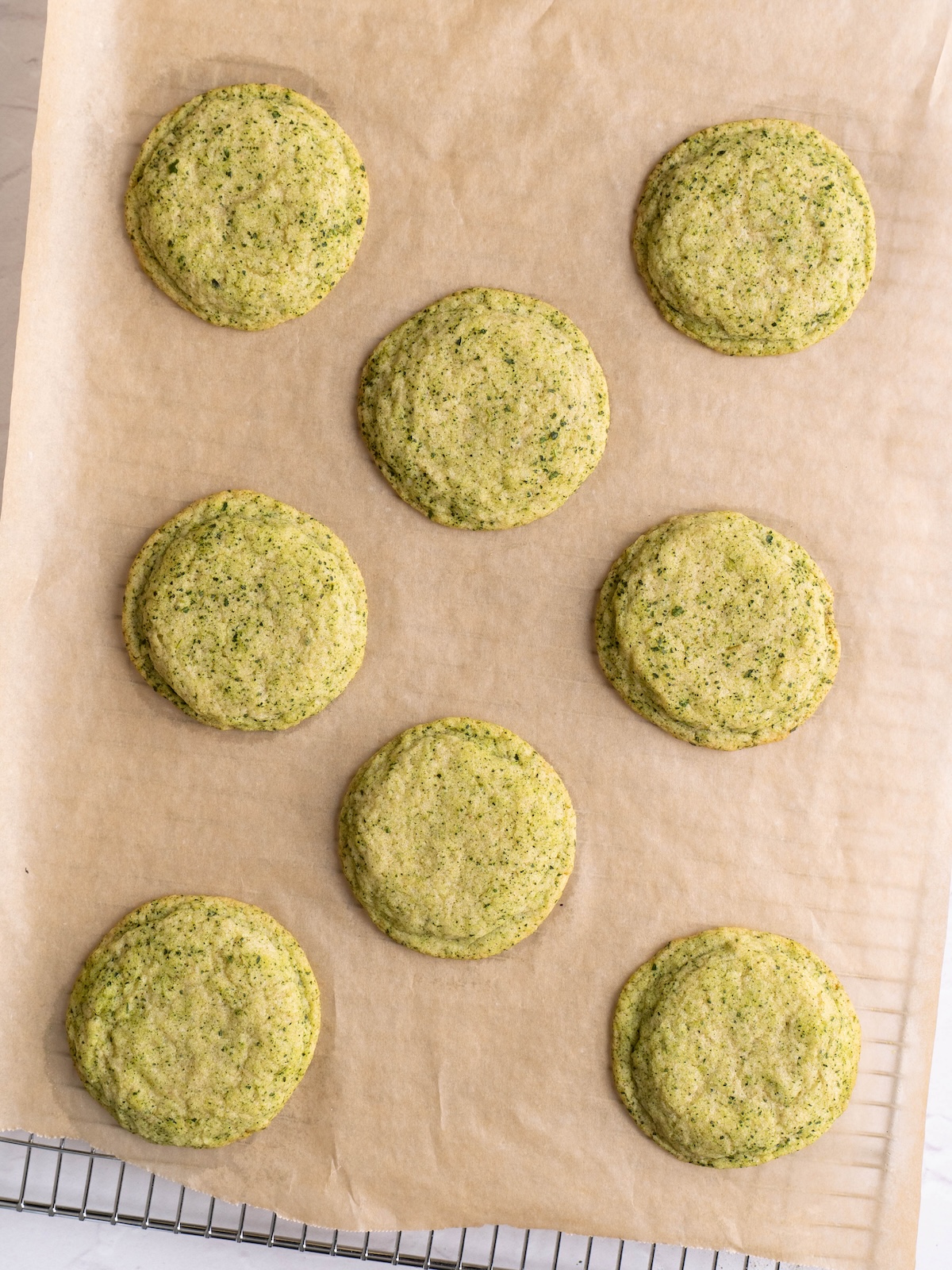 Fig leaf snickerdoodles, freshly baked, on a sheet pan