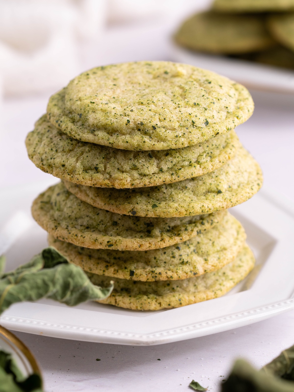 A stack of fig leaf snickerdoodle cookies on a plate