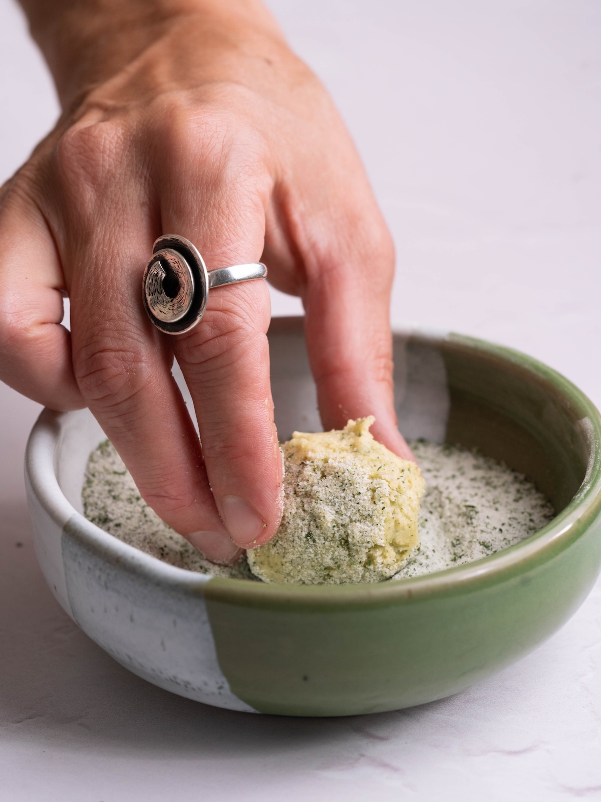 Rolling cookie dough in toasted fig leaf sugar