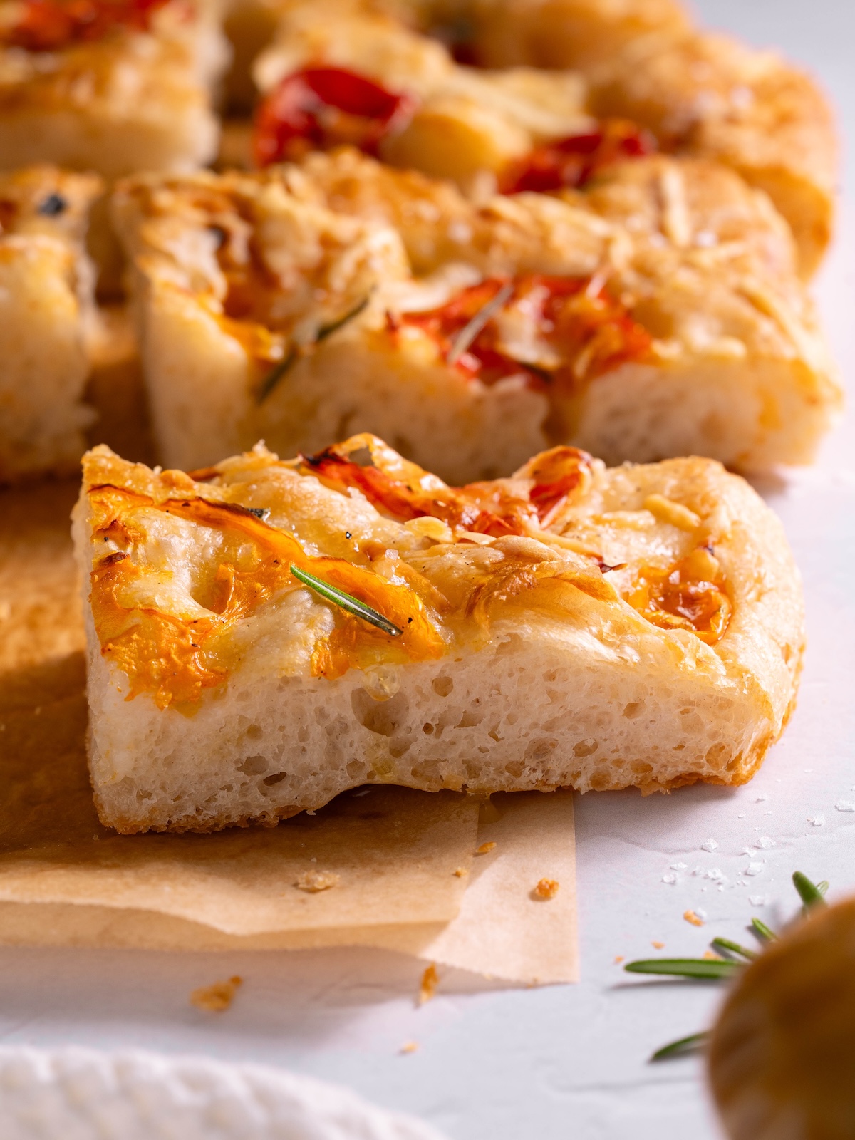 View from the side of a slice of focaccia bread