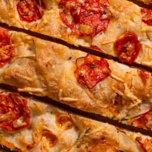 A close up look at slices of tomato focaccia