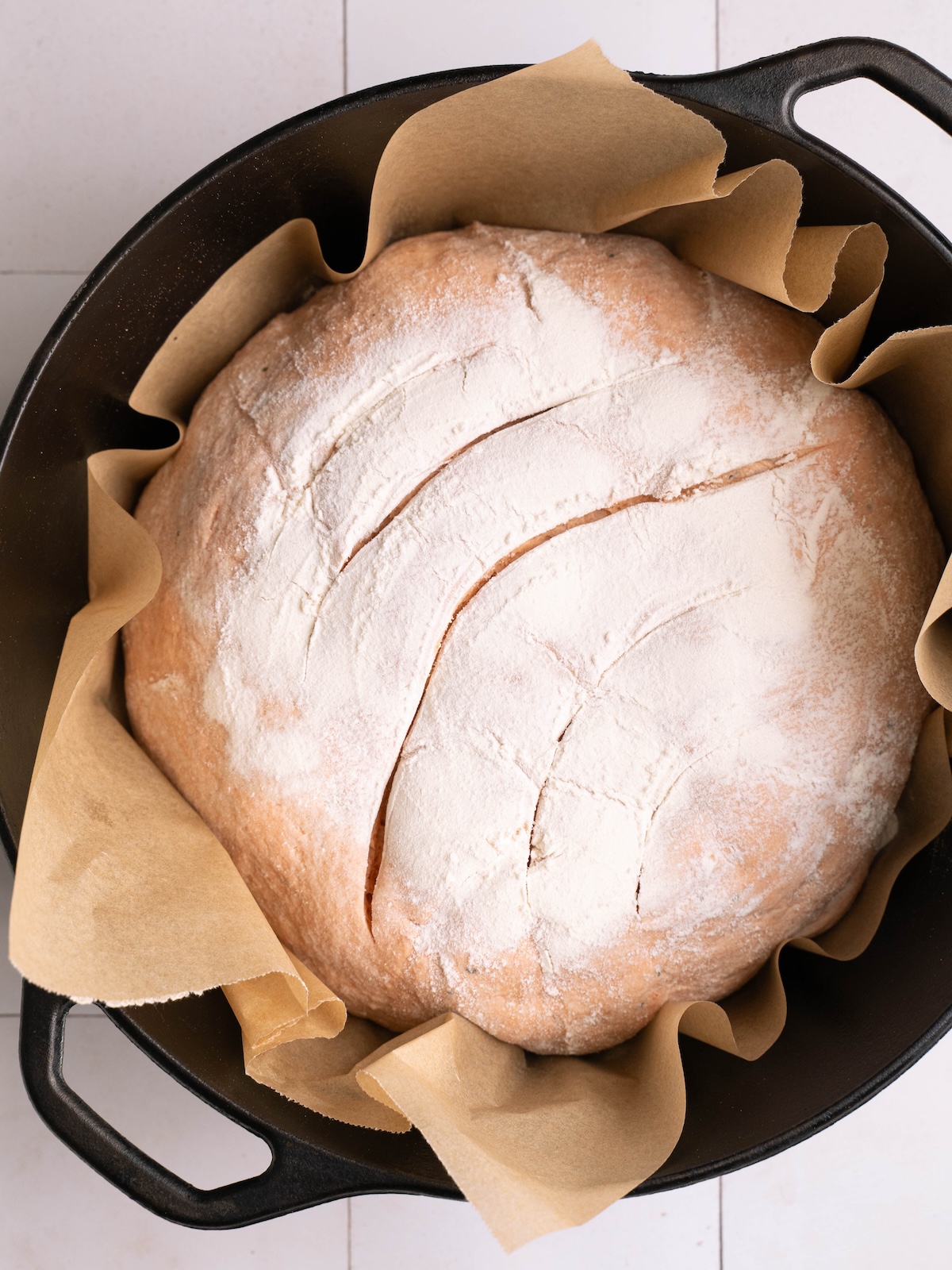 Sourdough scored with curved lines on top