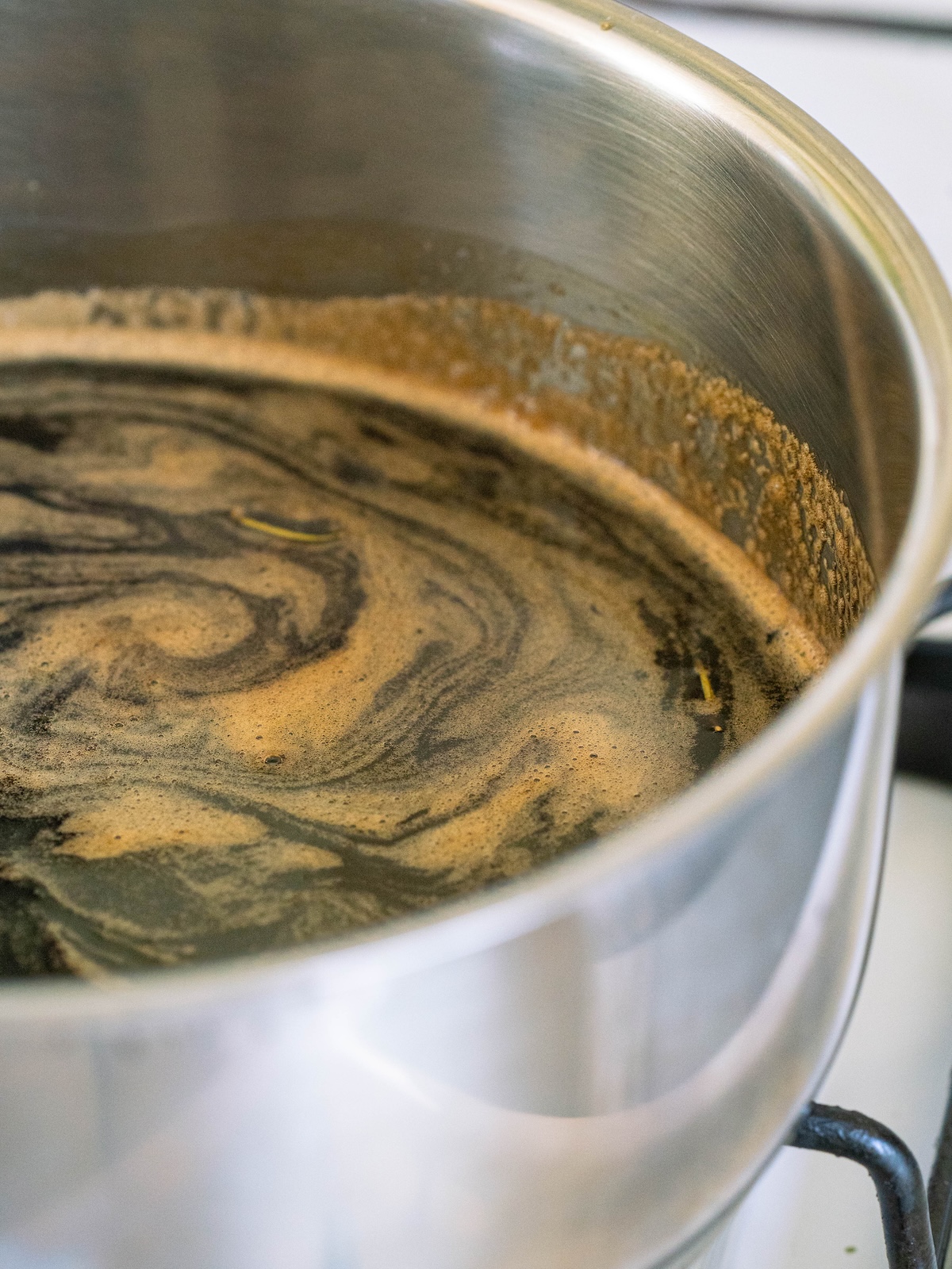 Melting brown sugar after it infused with unripe pine cone