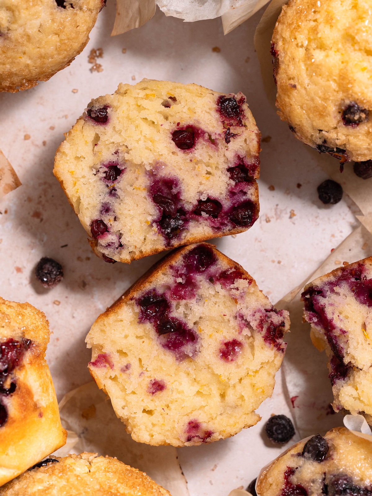 A sourdough huckleberry muffin split in half
