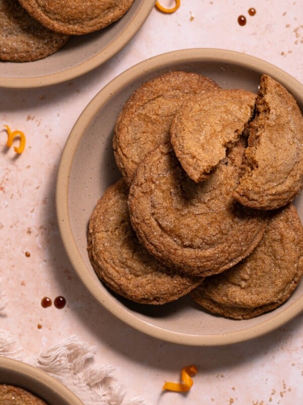 Pine cone molasses crinkle cookies stacked on dessert plates