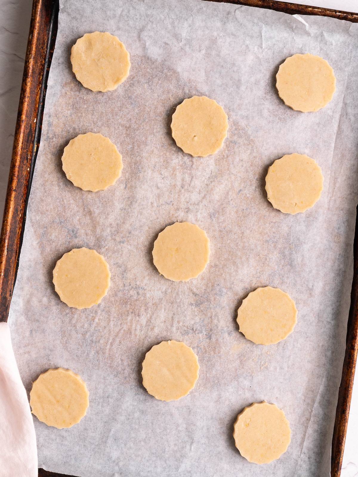 Shortbread cookies before baking on a cookie sheet